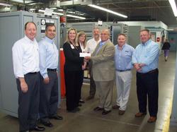 Pictured above: George Ardolino, AMETEK Division Vice President/Business Unit Manager, (center) presents $25,000 scholarship fund check to Vera Fosnot, Ohio State University Industry Liaison Director.  Also pictured from left:  Steve Wetta, Director of Engineering and Administration; Bogdan Proca, Director of R&D; Susan Midel, Director of HR; Nick Yarnell, Contracts Manager; Jim Lichtenberg, Business Manager of Prestolite Power; and Jason Cotton, Global Director of Sales and Service.  Photo Credit: Contributed