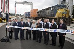 OPEN FOR BUSINESS
APPALACHIAN REGIONAL PORT TO SERVE FOUR-STATE REGION
Wednesday, August 22, 2018/Categories: Container Cargo, Economic Impact, Logistics, Press Release
Rate this article: 
No rating


 
 




 

Gov. Nathan Deal, center, cuts a ribbon during the Grand Opening of the Appalachian Regional Port near Chatsworth, Ga., Wednesday, Aug. 22, 2018. Improved rail access to the area has led to increased interest from manufacturers and logistics services. The inland terminal will be operated by the Georgia Ports Authority and served by CSX.
 Photo Credit: Contributed