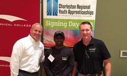 (L-R) Jeff Peterson, director of manufacturing at KION North America; Marcus Gore, youth apprentice; David Brown, director of human resources at KION North America. Photo Credit: Contributed