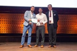 Tom Ison (middle) receiving the Karsten Moholt Exceptional Achievement Award from Mathis Menzel (left), Managing Director at Menzel Elektromotoren GmbH, and Frederic Beghain (right), General Manager at EASA Region 9.