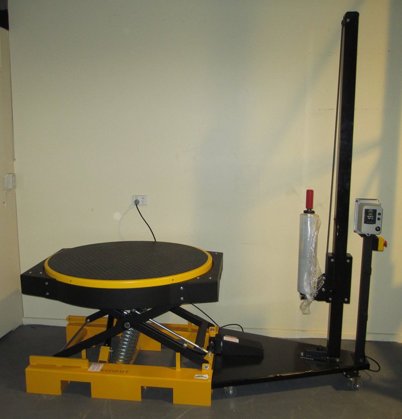 Roto-Wrap. Powered Turntable and Docking Stretch Wrapper