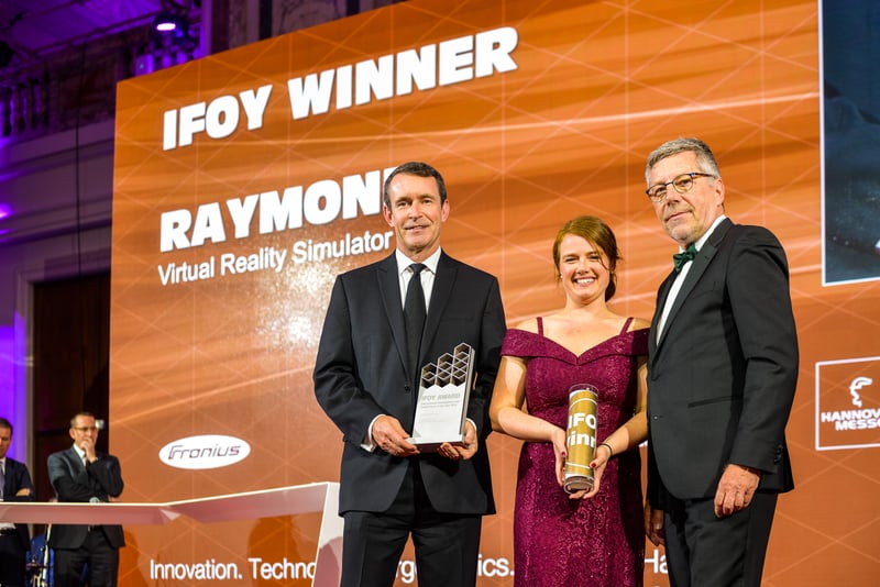 Raymond Accepts IFOY Award