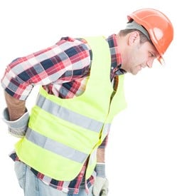 Young constructor suffering form back pain