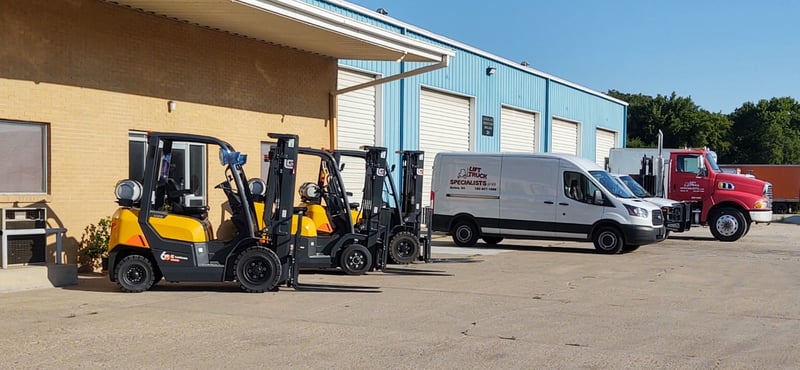 KS_Forklifts and Company vehicles in front of building 2