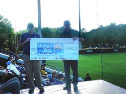 NMHG steps up to the plate with donation to United Way