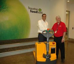 Mitsubishi Caterpillar Forklift America Inc. donates electric-powered walkie pallet truck to the Houston Food Bank