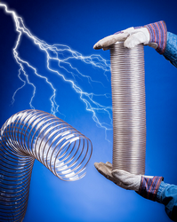 Static dissipative hose is clear, lightweight, flexible & compressible