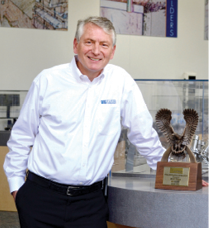 Chris Kaiser headshot with award 2016