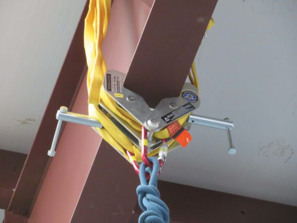 The clamps will be used to support a rappel line from an overhead beam.