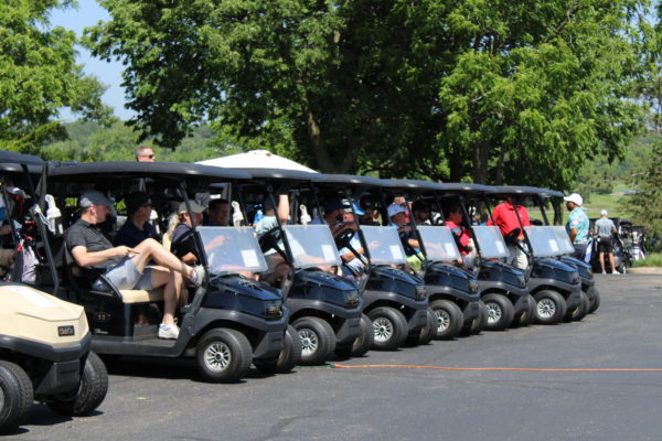 Orbis golf outing with carts