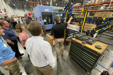 Mark Lippert explaining the CNC Cell machine image