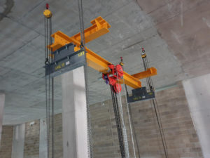 Beam section being raised to high level. image