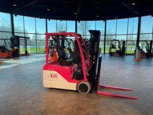 Toyota Material Handling auctions pink forklift to dealer network, Raising $65,000 for Breast Cancer Awareness