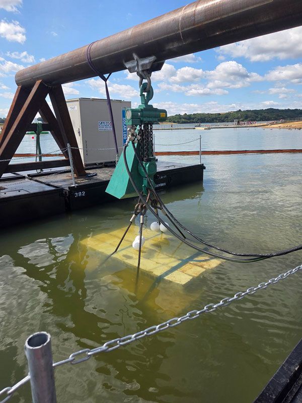 Load testing of the two air hoists and their supporting gantries was facilitated by a 20t/25t skid-mounted dynamic proof-test load