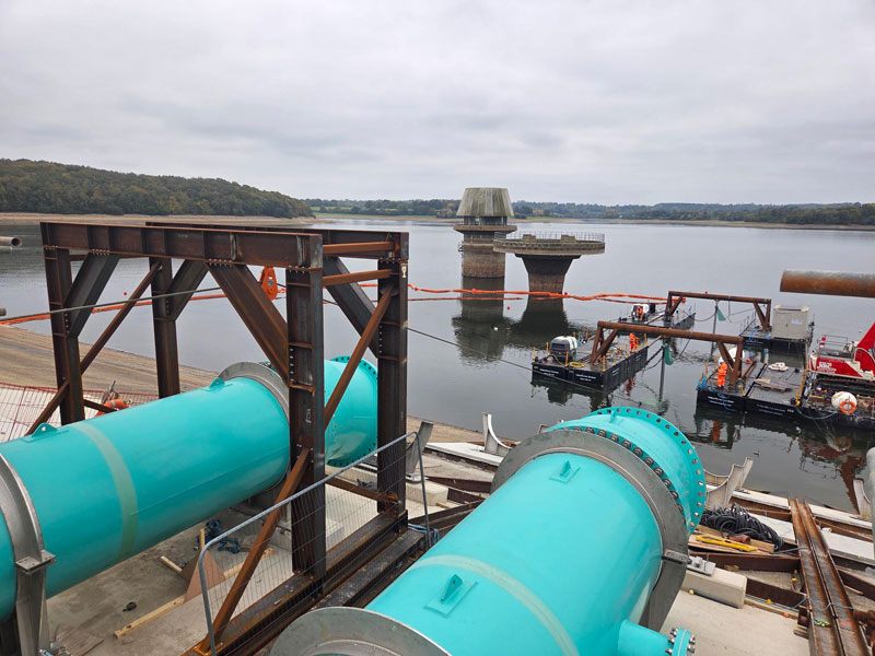 The final outcome was the highly successful movement up the reservoir dam wall of all three pipes in a finely controlled and smooth manner