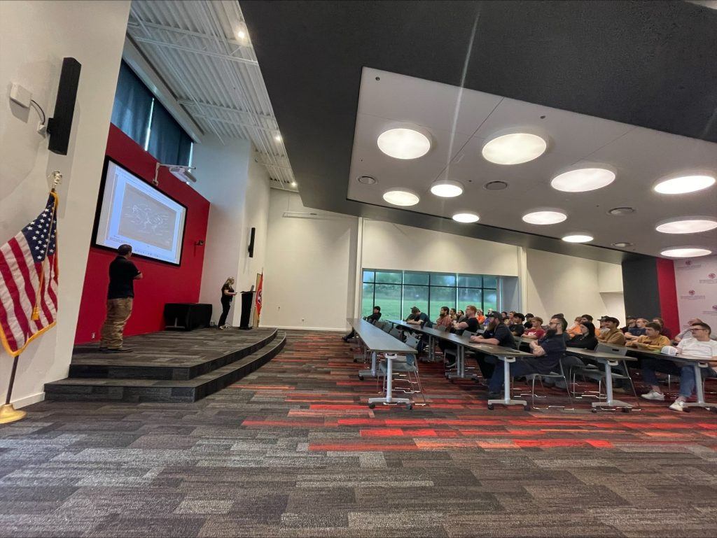 Amy Vass speaking at TCAT 