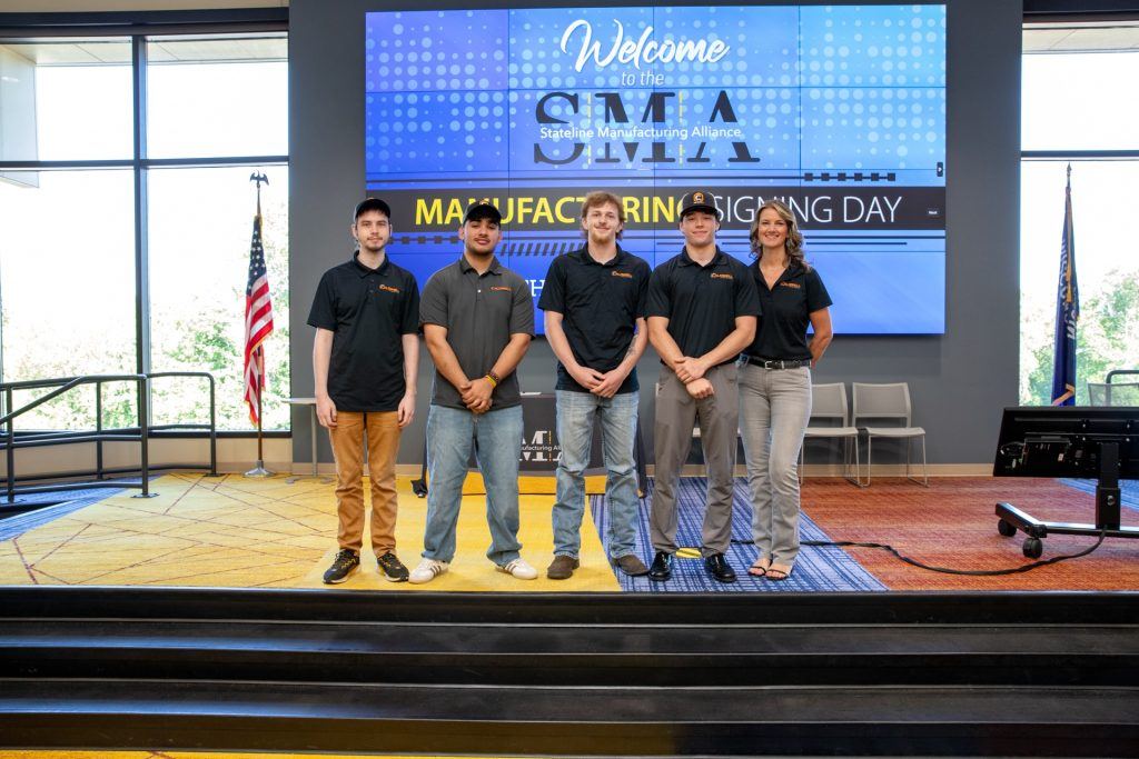 Amy Garris, who oversees education outreach; and Michael Stitt (far left), configurator engineer at Caldwell, image 2026